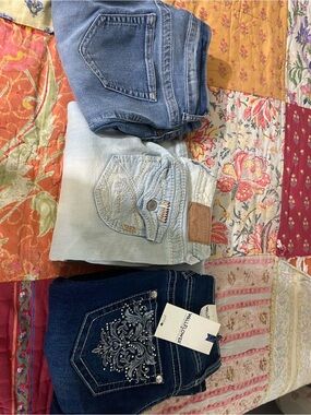 3 jeans one with tags
